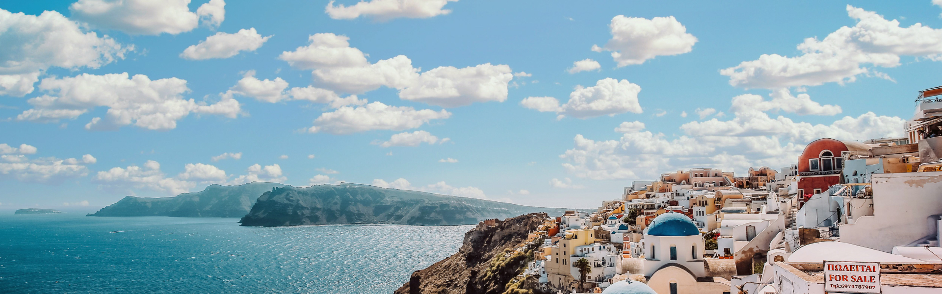 Whitewashed buildings overlooking the sea in Santorini, Greece